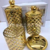 A new round sealed plastic bottle with a gold edge and diamond cap, a high-end candy jar and storage jar set of three pieces, gold-plated Specification image